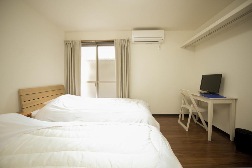 Guesthouse Kotoya Kyoto Station Bagian luar foto