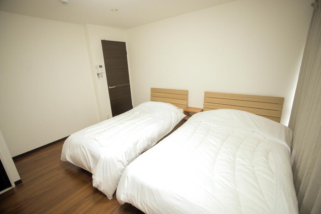 Guesthouse Kotoya Kyoto Station Bagian luar foto